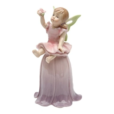 Image of StealStreet SS CG 20820, 4.5 Inch Painted Sitting Little Fairy Girl on Purple Tulip Figurine, Pink