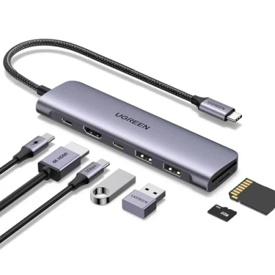 Image of UGREEN Revodok USB C Hub, 7 in 1 Adapter with 4K HDMI, 100W PD, and 2 A Data Ports 5Gbps, SD/microSD Card Slot, Dongle for MacBook M1/M2, iPhone 15 Pro Series, iPad, Surface