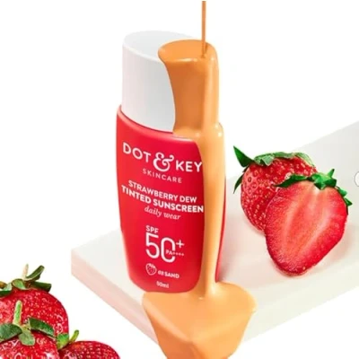Image of Dot &amp; Key Strawberry Dew Tinted Sunscreen SPF 50 PA with Niacinamide Hyaluronic Acid, available in Sand Medium (03) shade, 50ml for sun protection and hydration.