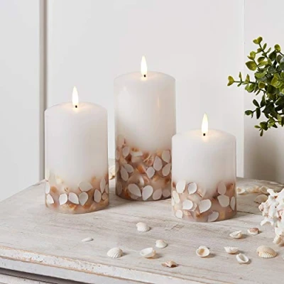 Image of Lights4fun Set of 3 TruGlow® Seashell Ivory Wax Battery Operated Flameless LED Pillar Candles with Remote Control