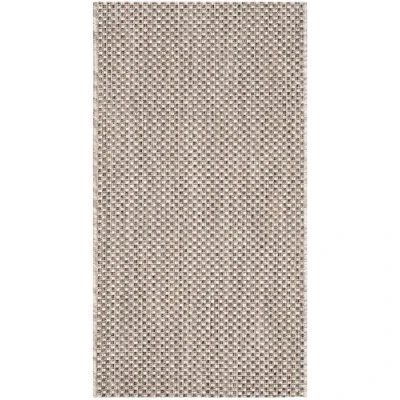 Image of SAFAVIEH Contemporary Rug for Indoor &amp; Outdoor Courtyard Collection, Short Pile, in Beige and Brown color, 122 X 170 cm