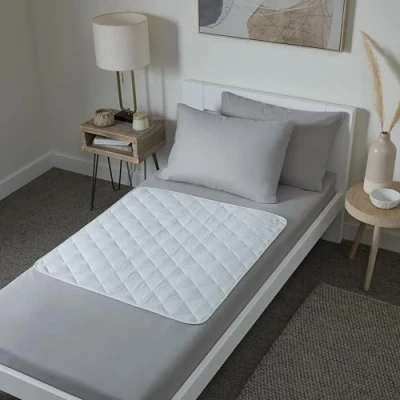 Image of Washable bed mats by guardedsleep Premium quality waterproof pads Incontinent wetting sheets for adults or children Reusable mattress protector incontinence