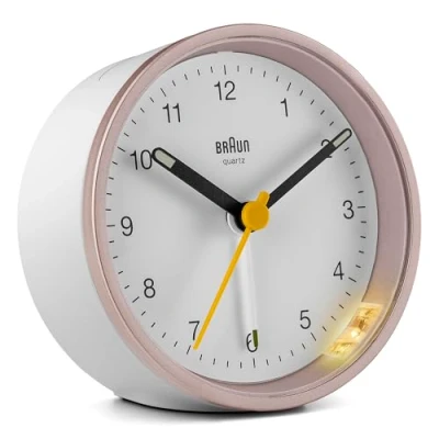Image of Braun Classic Analogue Alarm Clock With Snooze And Light, Quiet Quartz Movement, Crescendo Beep Pink/White BC12PW