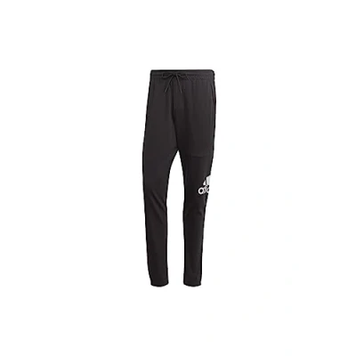 Image of adidas Men&#039;s Essentials Single Jersey Tapered Badge of Sport Pants, Black, M