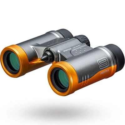 Image of PENTAX Binoculars UD 9x21 Gray and Orange. A bright clear field of view, lightweight body with roof prism, Fully Multi Coated optics, 9x magnification, ideal for concerts, sports, traveling.