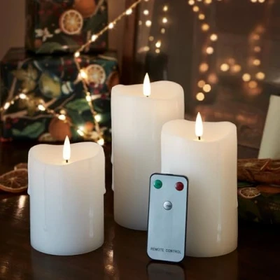 Image of Lights4fun Set of 3 TruGlow® Dripping Wax Battery LED Flameless Pillar Candles Real White with Remote Control