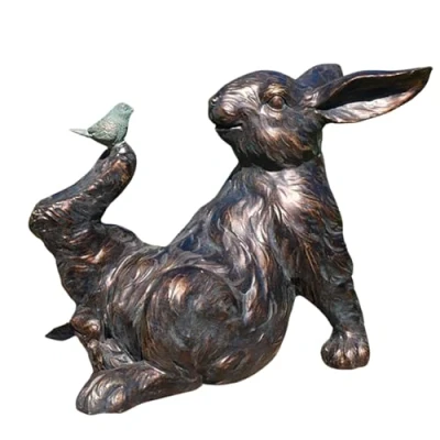 Image of Animal Crackers Bronze effect rabbit with Bird on foot quirky garden ornament decoration, lover gift