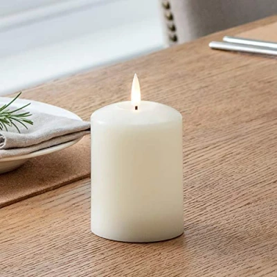 Image of Lights4fun Small TruGlow® Battery LED Flameless Pillar Candle with Timer 10cm Real Ivory Wax