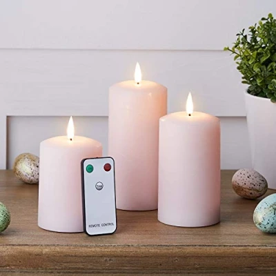 Image of Lights4fun Set of 3 Pink TruGlow® Battery LED Flameless Pillar Candles with Timer Real Wax Remote Control