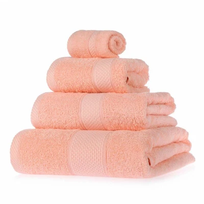 Image of HOMESCAPES Peach Turkish Cotton 4 Piece Towel Set Soft &amp; Absorbent 500 GSM Heavyweight Face Cloth, Hand Towel, Bath Sheet Bale