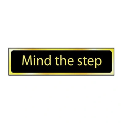 Image of Mind The Step Sign Self Adhesive PVC Black and Polished Gold Effect 200mm x 50mm