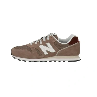 Image of New Balance 373 men&#039;s Shoes (Trainers) in Beige