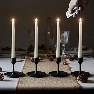 Image of Lights4fun Set of 4 Ivory TruGlow® Taper Candles with Remote Battery LED Flameless Real Wax Timer