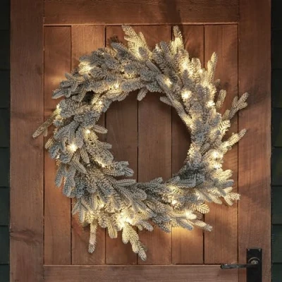 Image of Lights4fun 60cm Dual Lit Artificial Snowy Outdoor Battery Operated Christmas Wreath