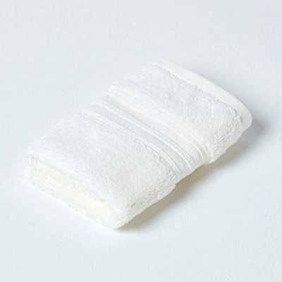 Image of HOMESCAPES Luxury Cream Soft 100% Supima Cotton Face Cloth Zero Twist Super Absorbent &amp; Fluffy 550 GSM Thick Plain Flannel Wash