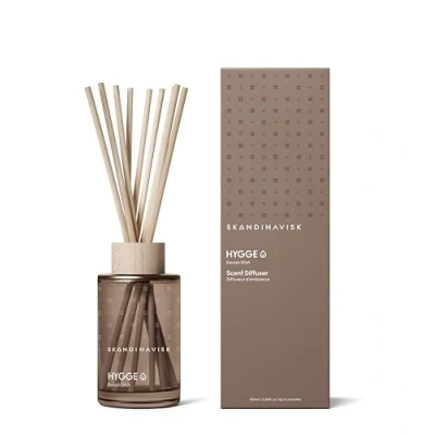 Image of Skandinavisk HYGGE ‘Cosiness’ Reed diffuser with 8 Reeds, Lasts +3 Months, Scent Notes: Black tea and mint leaves, dried apples baked cinnamon, 100 ml