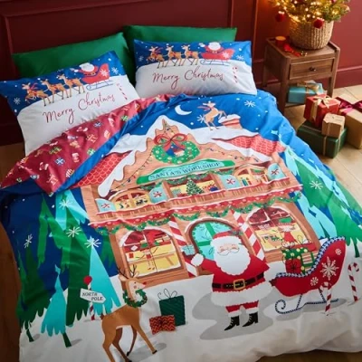 Image of Catherine Lansfield Christmas Santa&#039;s Workshop Reversible King Duvet Cover Set with Pillowcases Navy Blue