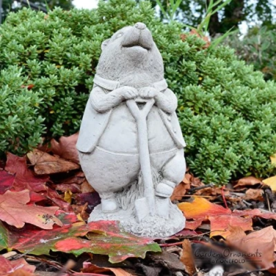 Image of ONEFOLD Stone Beatrix Potter inspired Hedgehog and Shovel Ornament Outdoor Garden Sculpture