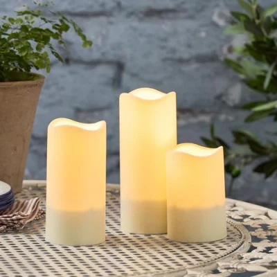 Image of Lights4fun Set of 3 Solar Powered Warm White Flickering Flame LED Flameless Ivory Garden Patio Candles IP44 Rated Outdoor Use