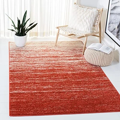 Image of Safavieh Modern Ombre Rug for Living Room, Dining Bedroom Adirondack Collection, Short Pile, in Orange and Grey, 135 X 196 cm