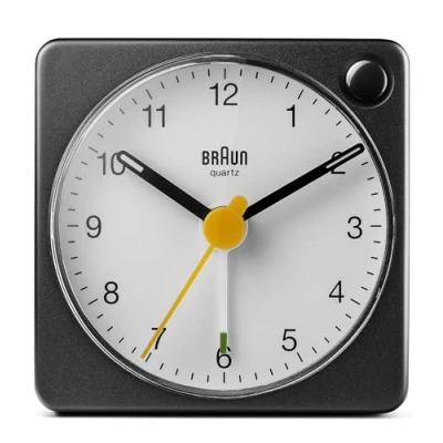 Image of Braun Classic Analogue Travel Alarm Clock with Snooze Function and Light, Compact Size, Quiet Quartz Movement, Crescendo Alarm, Black White Model BC02XBW