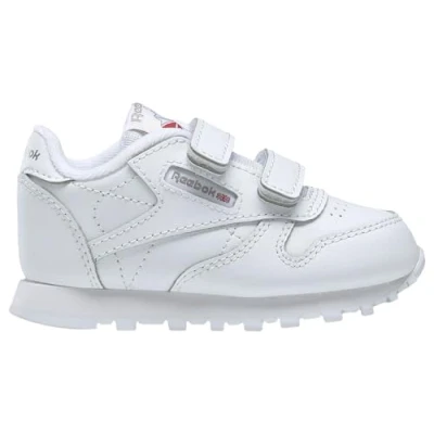 Image of Reebok Unisex Baby Classic Leather 2V Sneaker, White/Carbon/Vector Blue, 5.5 UK Child