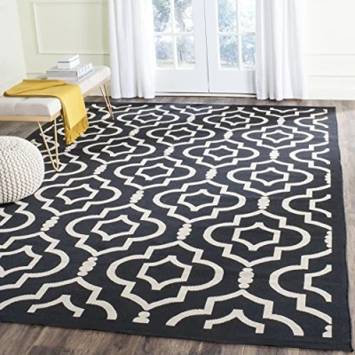 Image of SAFAVIEH Trellis Rug for Indoor &amp; Outdoor Courtyard Collection, Short Pile, in Black and Beige color, 79 X 152 cm