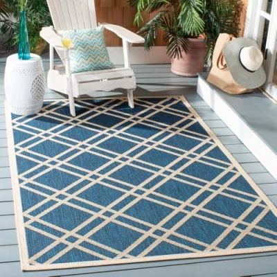 Image of SAFAVIEH Trellis Rug for Indoor &amp; Outdoor Courtyard Collection, Short Pile, in Navy and Beige color, 160 X 231 cm