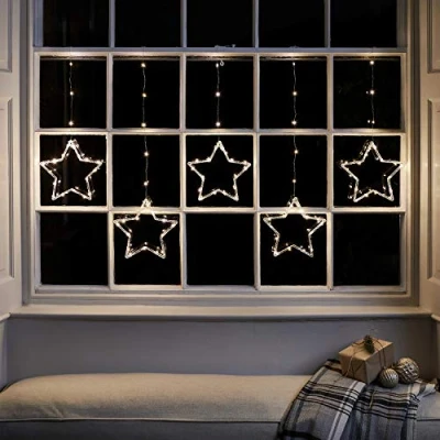 Image of Lights4fun Christmas Indoor Star Curtain Window Light Decoration with 100 LEDs Plug in