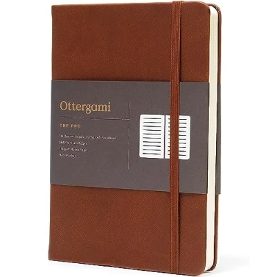 Image of Ottergami A5 Notebook Hardback The Pro Lined Journal 192 Pages, Thick 150gsm Paper Note Book Luxury Vegan Leather Journals for Women &amp; Men Work University Essentials (Brown)