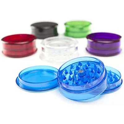 Image of Karrma ltd. Set of 2 Plastic Herb Grinder 3 Part Magnetic Shark Teeth Assorted Colours, 60mm Piece Grinders, Portable and Pocket Size, Smell Proof Airtight Stash Compartment