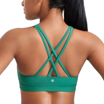 Image of CRZ Yoga Women&#039;s Strappy Back Sports Bra Mid Impact Wirefree Padded Workout Crop Top Cascadia Green S