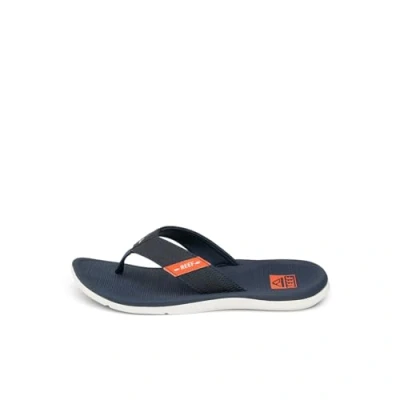 Image of REEF Santa Ana Men&#039;s Flip Flop, Arch Support, Water Friendly, Non Marking Outsole, Navy/White/Orange, 9