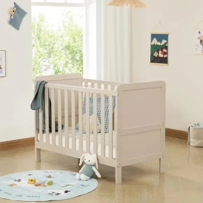 Image of Babymore Caro Urban Mini Cot Bed Cashmere Convertible to Toddler Up 5 Years, 3 Adjustable Mattress Base Positions, Baby With Protective Teething Rails Not Included