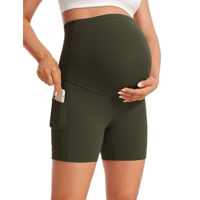 Image of CRZ Yoga Women&#039;s Butterluxe Maternity Shorts with Pockets 5&quot; Over The Belly Biker Workout Pregnancy Leggings Olive Green 12