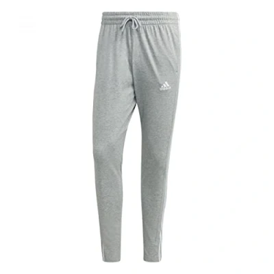 Image of adidas Men&#039;s Essentials Single Jersey Tapered Open Hem 3 Stripes Pants, Medium Grey Heather/White, XL