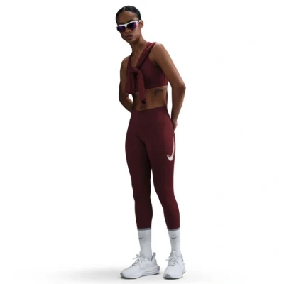 Image of Nike Fast Mid Rise 7/8 Tights for Women in Dark Team Red Perfect Running and Training