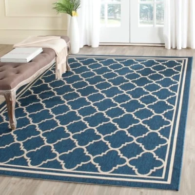 Image of SAFAVIEH Trellis Rug for Indoor &amp; Outdoor Courtyard Collection, Short Pile, in Navy and Beige color, 160 X 231 cm