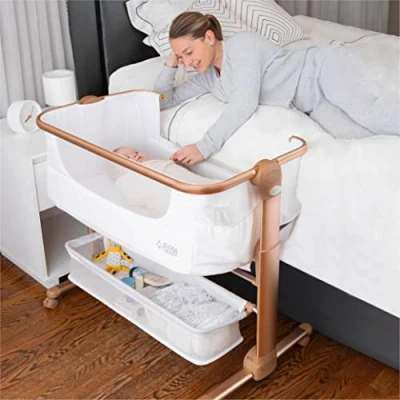 Image of Baby Bassinet, Bedside Sleeper for Baby, Easy Folding Portable Crib with Storage Basket Newborn, Comfy Mattress/Travel Bag Included (White and Gold)