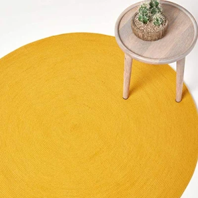 Image of HOMESCAPES Mustard Yellow Handmade Braided Round Rug For Bedroom &amp; Living Room Reversible Woven Cotton Circular Rug, 150 cm
