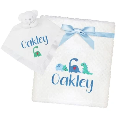Image of Personalised Baby Dinosaurs White Embroidered Luxury Waffle Blanket and Comforter Gift Set