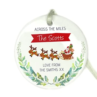 Image of GuteGifts Personalised ACROSS THE MILES Christmas Ceramic Bauble Customize with Any Name Gift for Friends,Family Member, Xmas Tree Decor Ornaments 2021 Hanging Sign Keepsake, White
