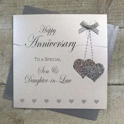 Image of WHITE COTTON CARDS SON &amp; DAUGHTER IN LAW ANNIVERSARY CARD HANGING HEARTS DESIGN, HAND FINISHED (LL73 A SD)