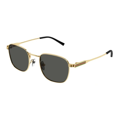 Image of Gucci Man GG1876S 001 Sunglasses Metal Gold Grey Round