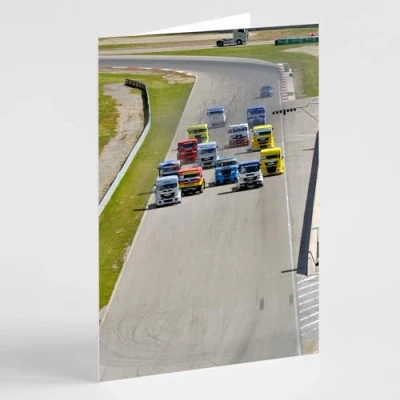 Image of Truck cabs on grand prix track birthday card