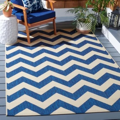 Image of SAFAVIEH Chevron Rug for Indoor &amp; Outdoor Courtyard Collection, Short Pile, in Navy and Beige color, 160 X 231 cm