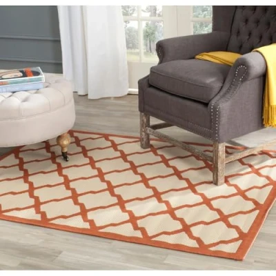 Image of SAFAVIEH Trellis Rug for Indoor &amp; Outdoor Courtyard Collection, Short Pile, in Beige and Terracotta color, 122 X 170 cm