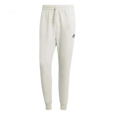 Image of adidas Men&#039;s Essentials Fleece Regular Tapered Pants, Alumina, XXS Short