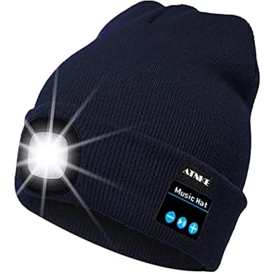 Image of ATNKE LED Lighted Bluetooth Beanie Cap, USB Rechargeable Wireless Musical Running Hat Ultra Bright 4 Waterproof Light Lamp Use for Skiing Hiking Camping Cycling (Navy Blue)