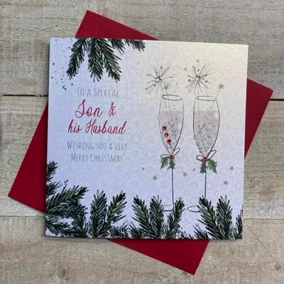 Image of WHITE COTTON CARDS SON &amp; HIS HUSBAND FLUTES WITH SPARKLERS CHRISTMAS CARD, HAND FINISHED (C23 1 SH)